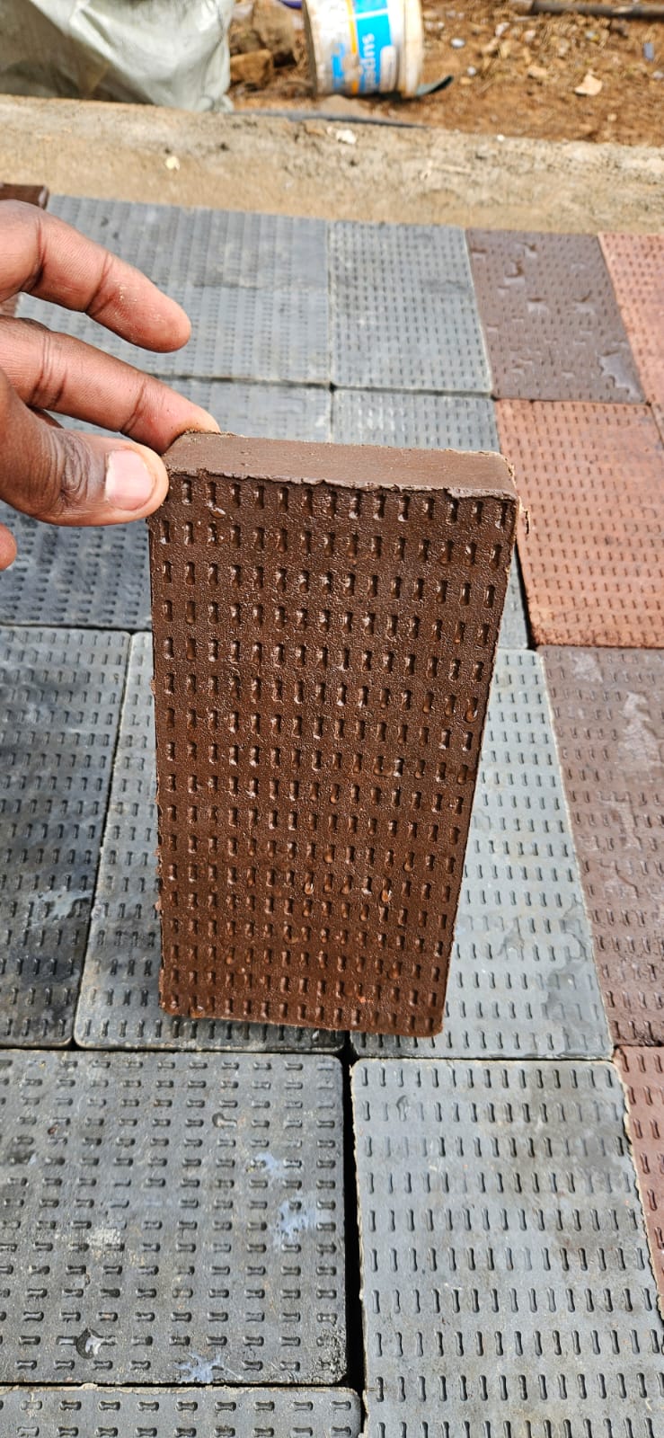 Interlocking pavers manufactured by Lexah Holdings from recovered plastic and sand